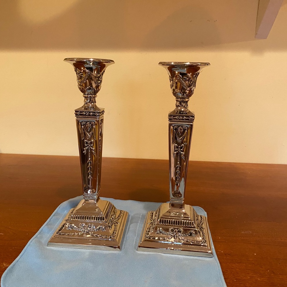 2 brand new silver color candle holders